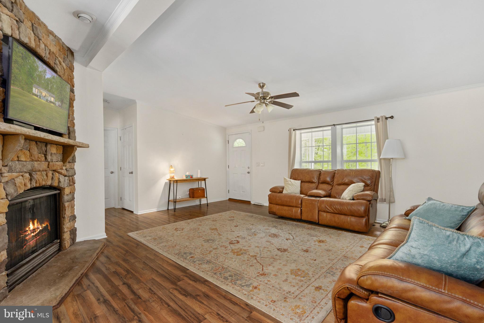 2319 Sizer Road Beaverdam, VA 23015 - Photo 19 of 61 Cozy living space with stone fireplace.