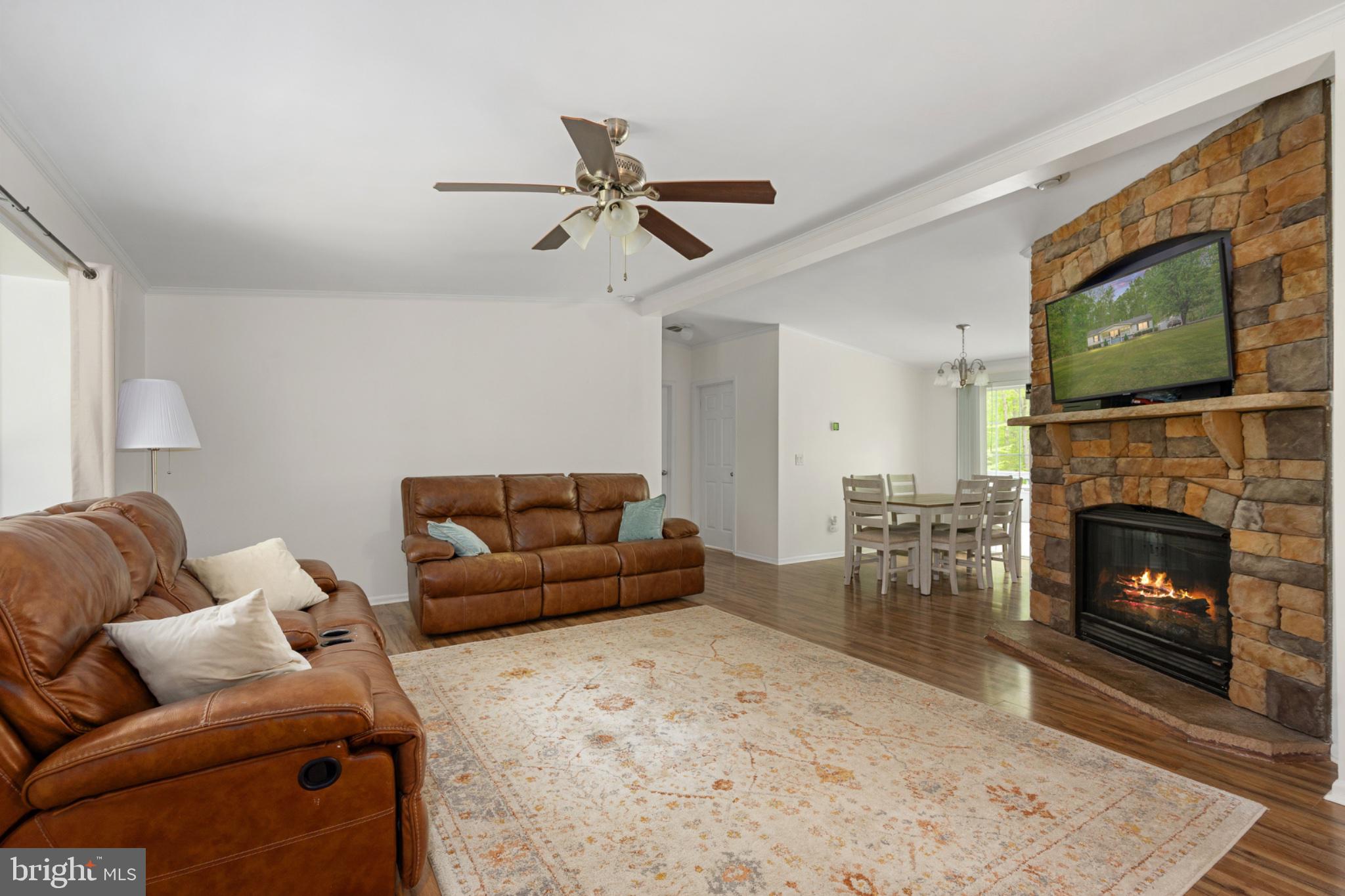 2319 Sizer Road Beaverdam, VA 23015 - Photo 22 of 61 Cozy living space with stone fireplace.
