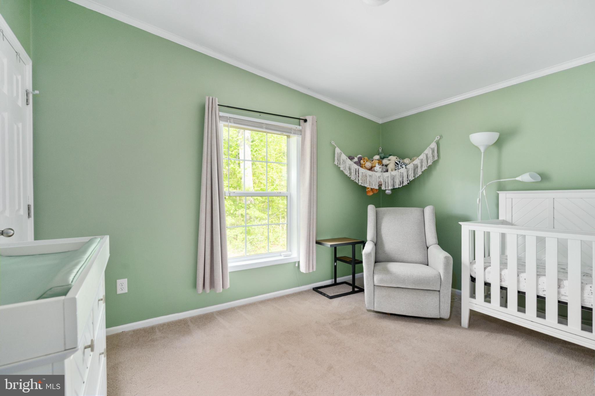 2319 Sizer Road Beaverdam, VA 23015 - Photo 23 of 61 Serene nursery with soft green hues.