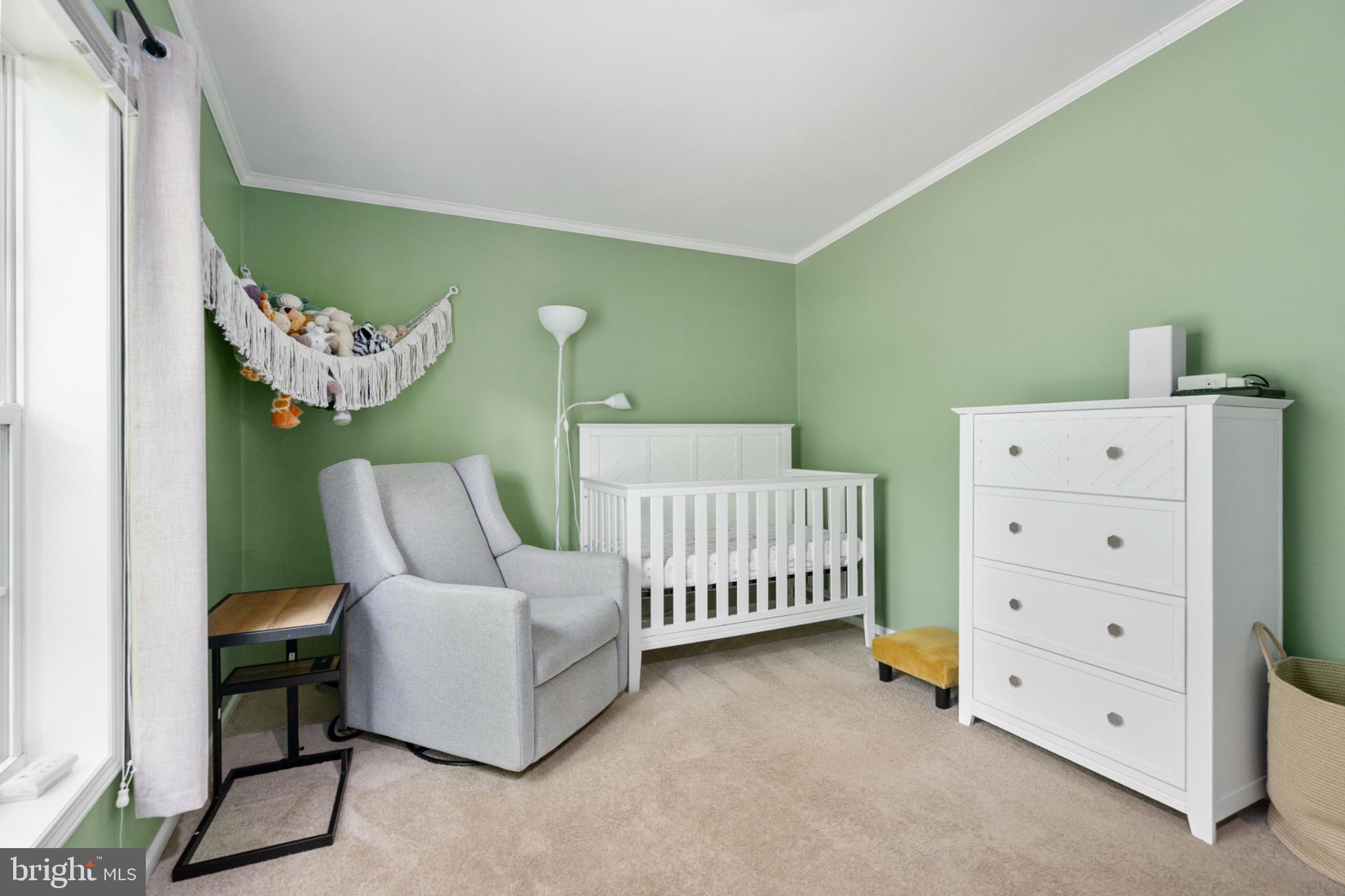 2319 Sizer Road Beaverdam, VA 23015 - Photo 35 of 61 Serene nursery with calming green hues.
