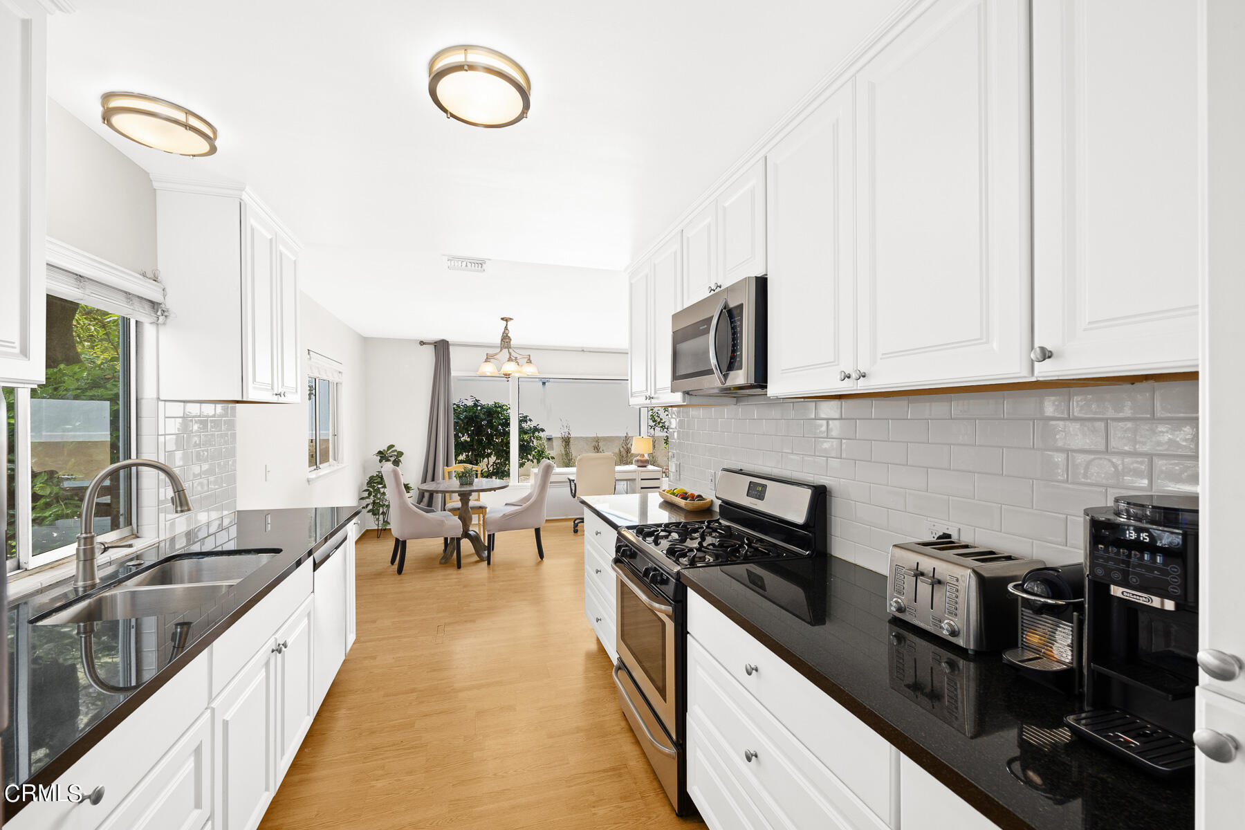 636 Knight Way La Canada Flintridge, CA 91011 - Photo 12 of 44 a kitchen with granite countertop a sink a counter space cabinets and stainless steel appliances