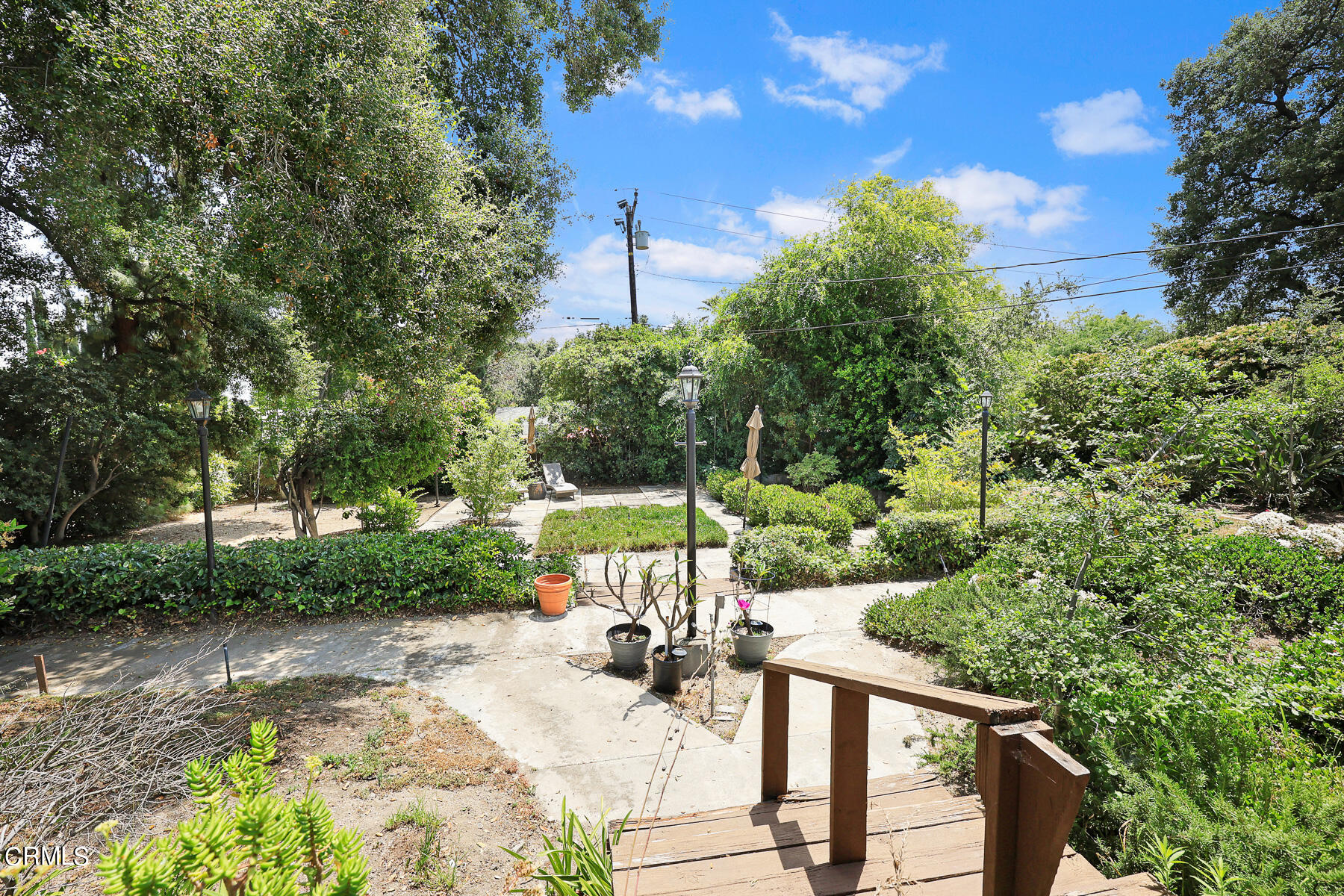 636 Knight Way La Canada Flintridge, CA 91011 - Photo 28 of 44 a view of a patio with two chairs next to a yard