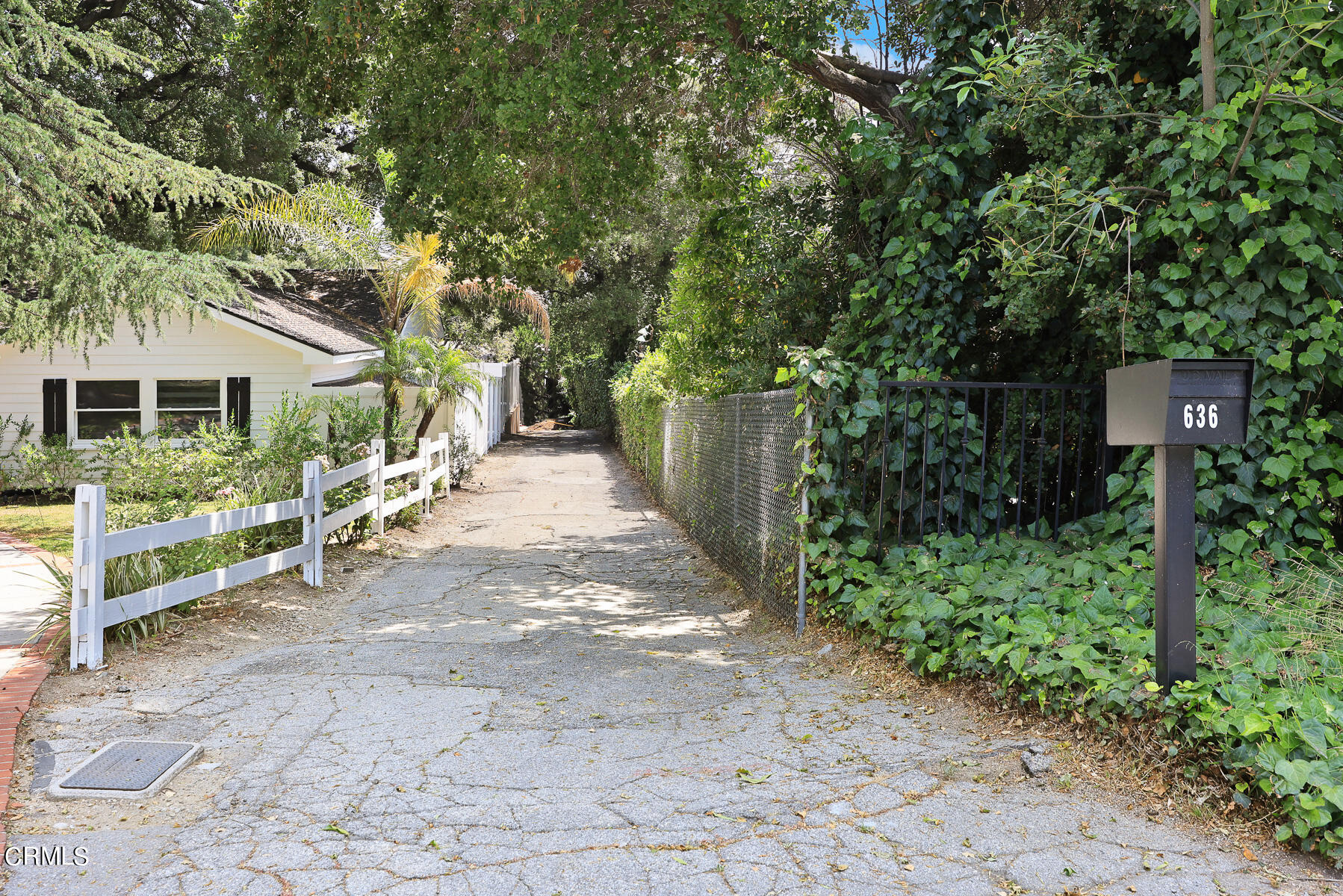 636 Knight Way La Canada Flintridge, CA 91011 - Photo 35 of 44 a view of a small yard in front of a house with wooden fence