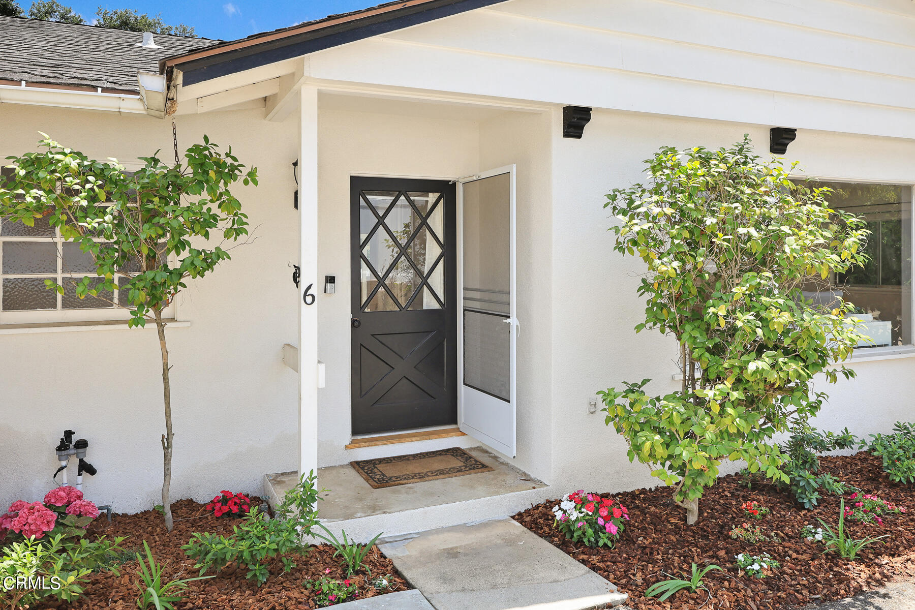 636 Knight Way La Canada Flintridge, CA 91011 - Photo 4 of 44 a flower pot with a potted plant in front of door