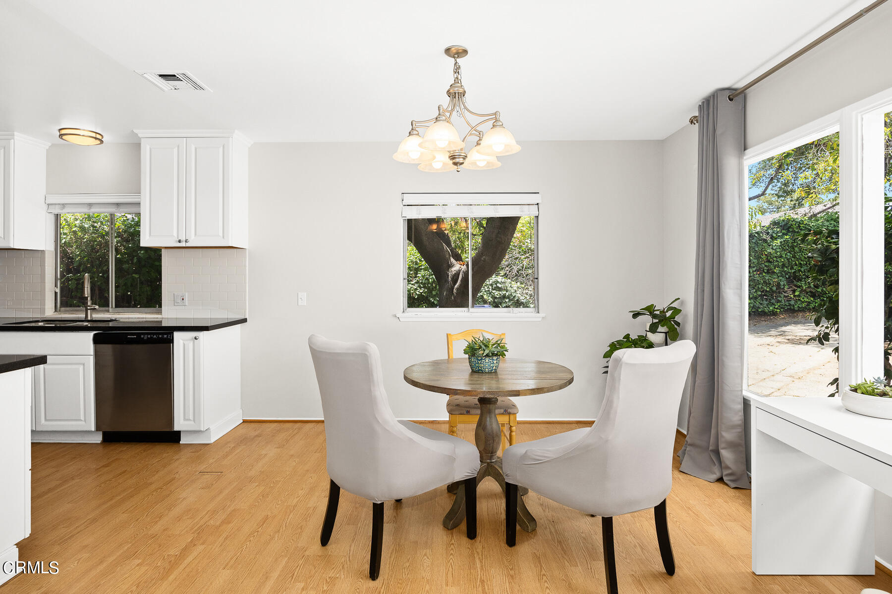636 Knight Way La Canada Flintridge, CA 91011 - Photo 10 of 44 a view of a dining room with furniture window and outside view