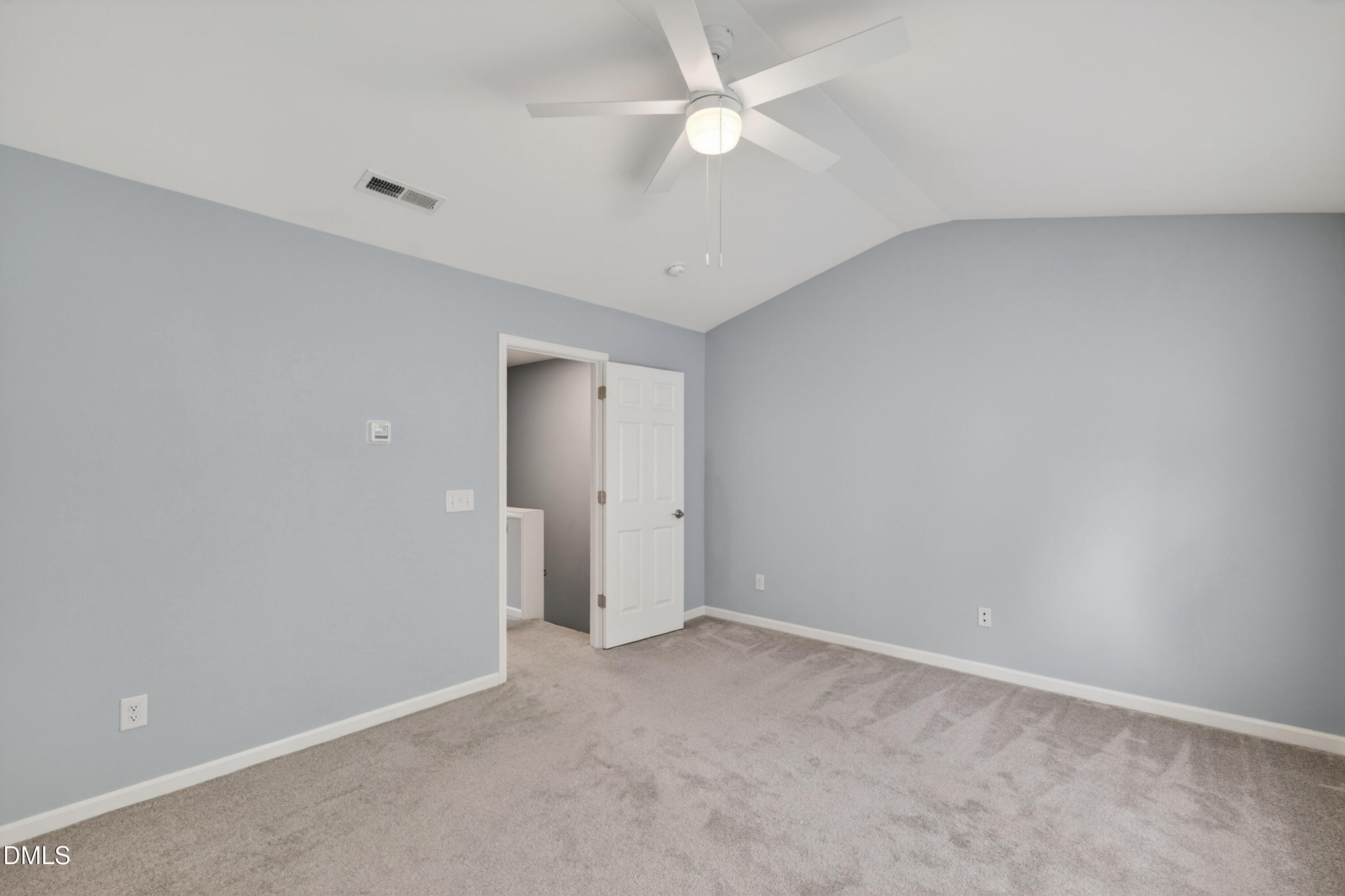 5421 Golden Arrow Lane Raleigh, NC 27613 - Photo 28 of 49 an empty room with a ceiling fan and a ceiling fan