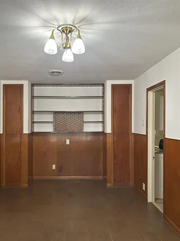 en view of an empty room with a window