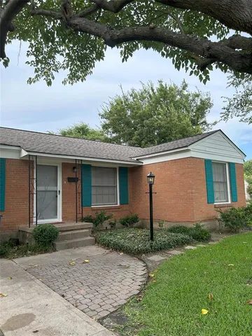 front view of house with a yard