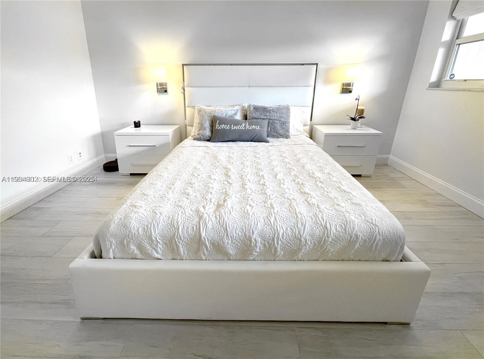 2671 South Course Drive, Unit 109 Pompano Beach, FL 33069 - Photo 16 of 39 a living room with furniture and a couch