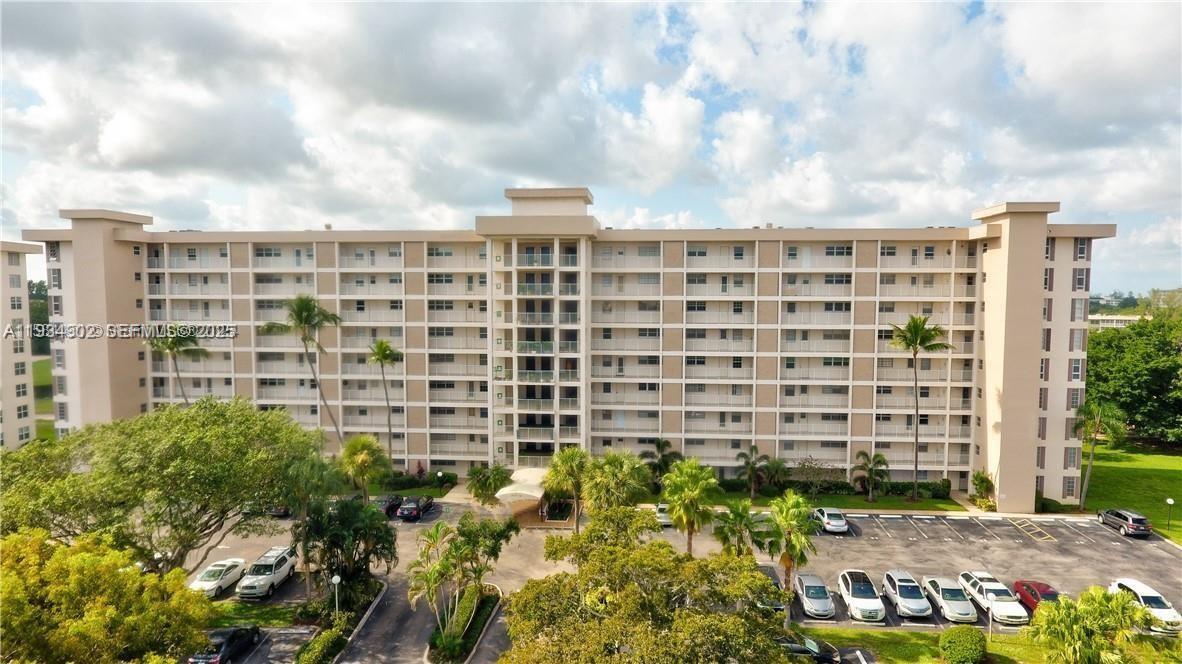 2671 South Course Drive, Unit 109 Pompano Beach, FL 33069 - Photo 30 of 39 a front view of a building