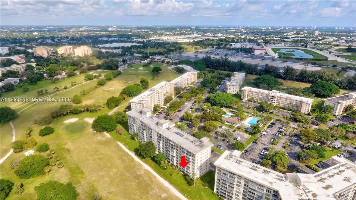 2671 South Course Drive, Unit 109 Pompano Beach, FL 33069 - Photo 35 of 39 an aerial view of residential houses with outdoor space