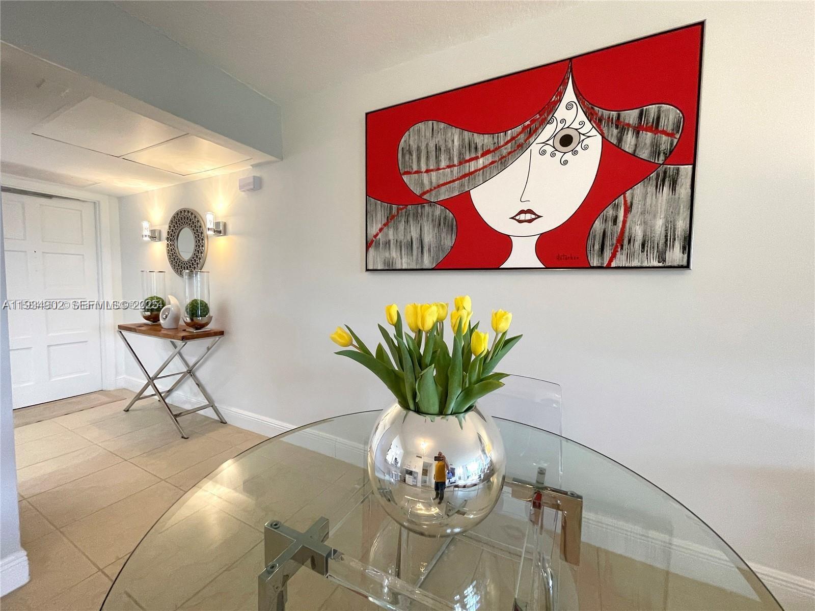 2671 South Course Drive, Unit 109 Pompano Beach, FL 33069 - Photo 10 of 39 a view of a bench in a living room