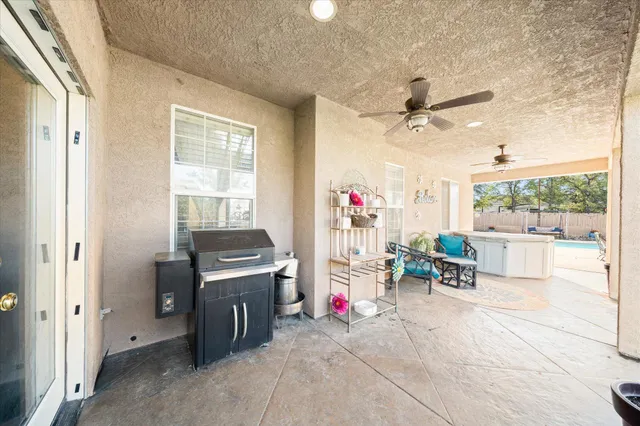 a view of house with a garden and a pathway