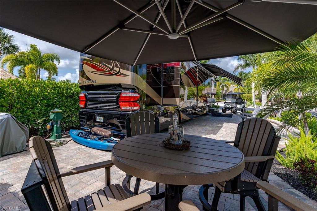 13571 Snook Circle Naples, FL 34114 - Photo 16 of 47 a view of outdoor space yard and patio