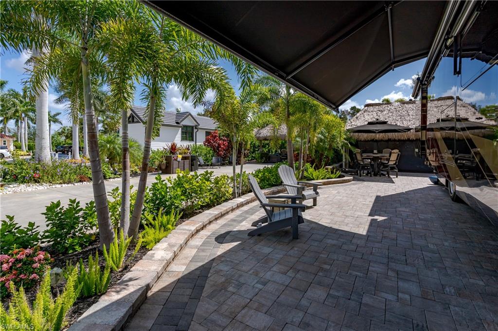 13571 Snook Circle Naples, FL 34114 - Photo 18 of 47 a view of outdoor space yard and patio