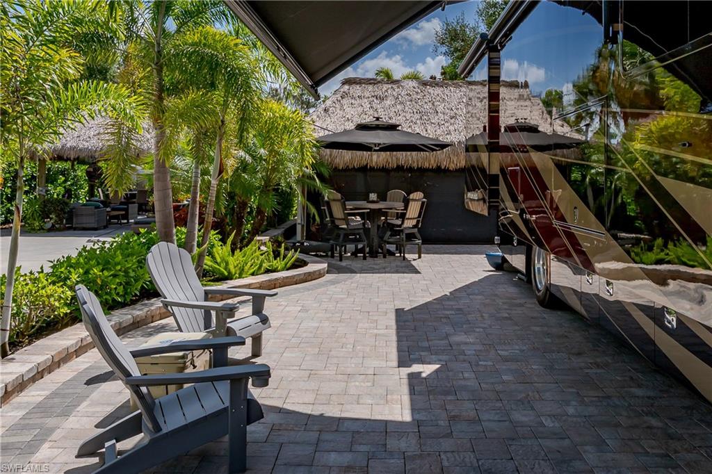 13571 Snook Circle Naples, FL 34114 - Photo 23 of 47 a view of outdoor space and seating