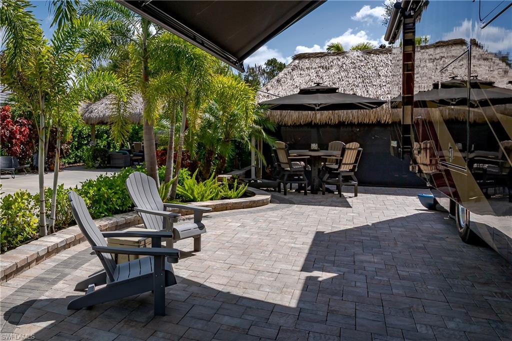 13571 Snook Circle Naples, FL 34114 - Photo 24 of 47 a view of outdoor space yard and patio