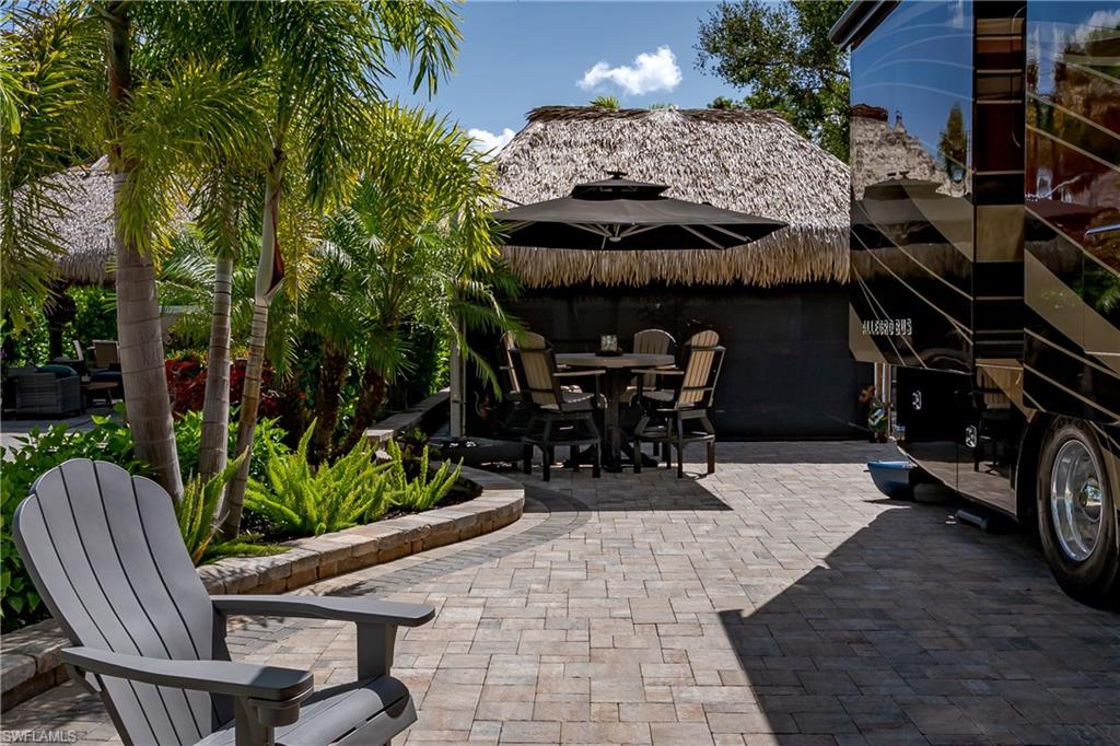 13571 Snook Circle Naples, FL 34114 - Photo 27 of 47 a view of outdoor space yard and patio