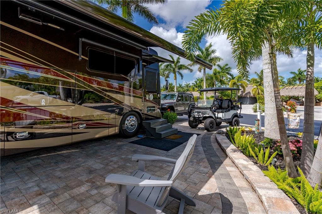 13571 Snook Circle Naples, FL 34114 - Photo 31 of 47 a view of car parked in patio