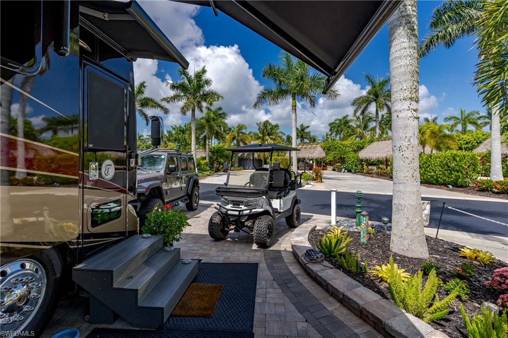 13571 Snook Circle Naples, FL 34114 - Photo 39 of 47 a view of yard with patio