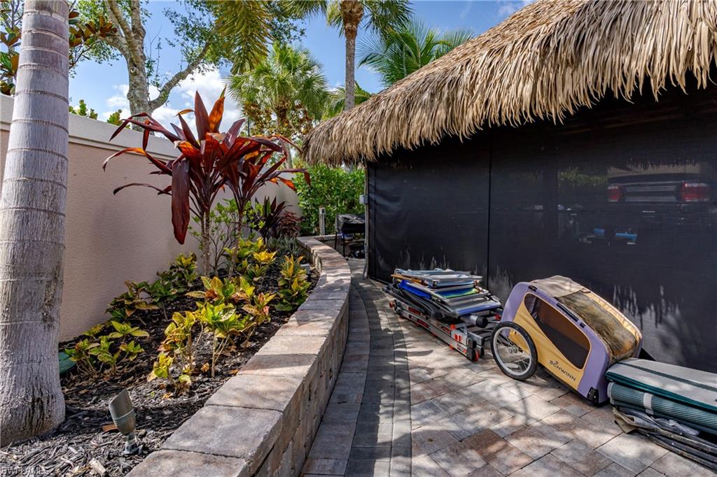 13571 Snook Circle Naples, FL 34114 - Photo 9 of 47 a backyard of a house with lots of green space