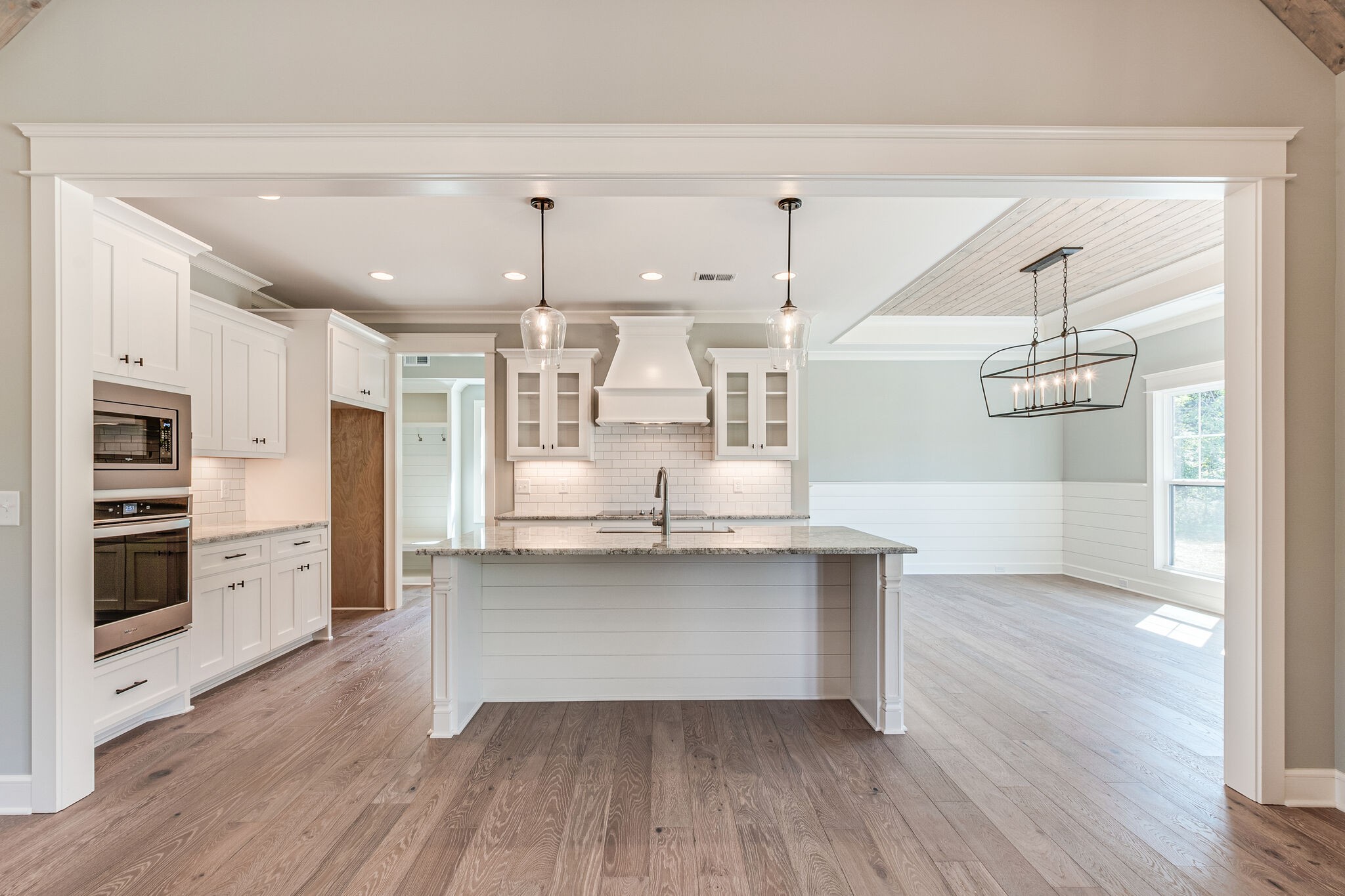 12425 North Milton Road Milton, TN 37118 - Photo 11 of 34 a kitchen with stainless steel appliances a kitchen island hardwood floor and a sink