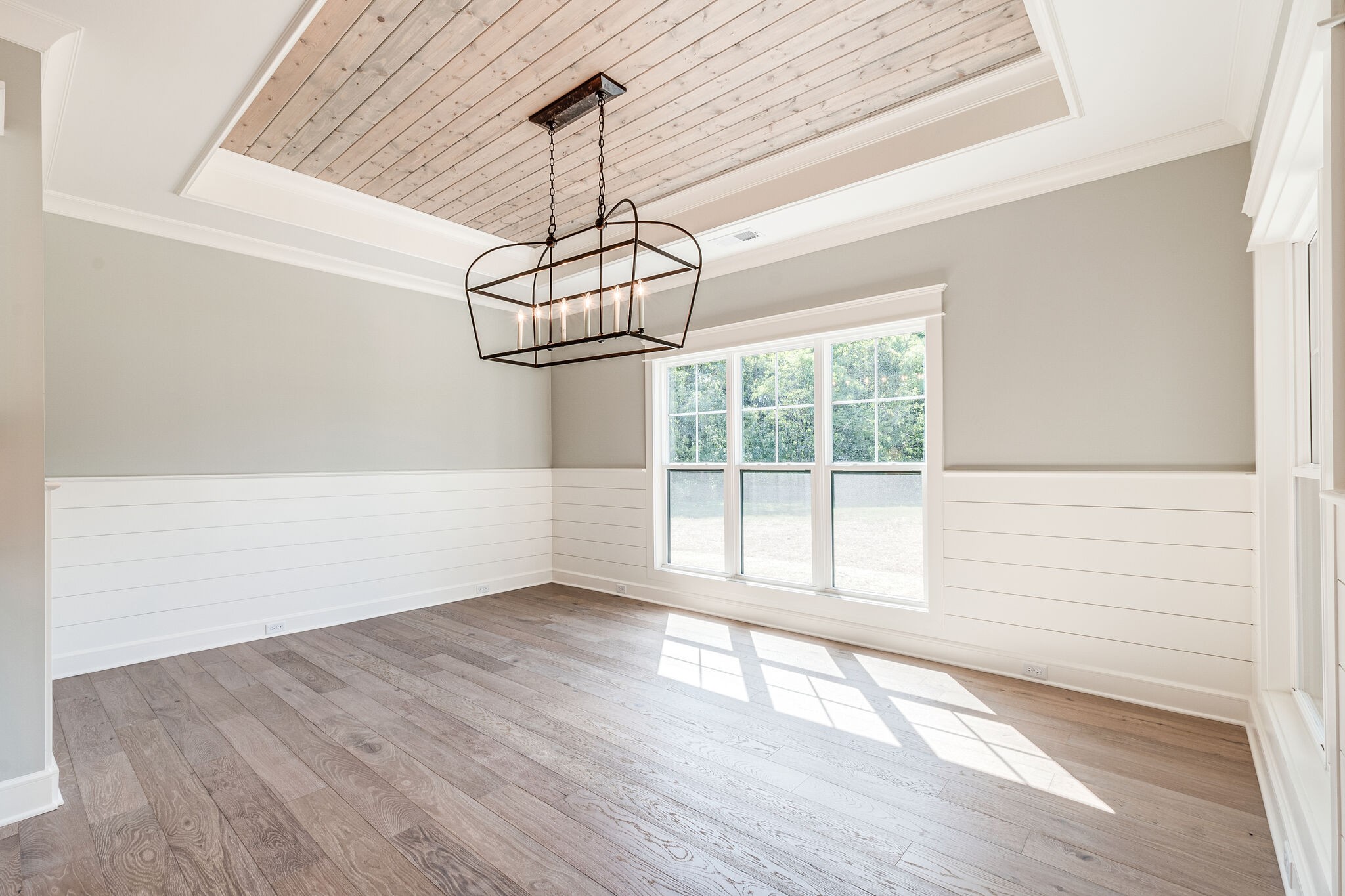 12425 North Milton Road Milton, TN 37118 - Photo 17 of 34 a view of empty room with wooden floor and fan