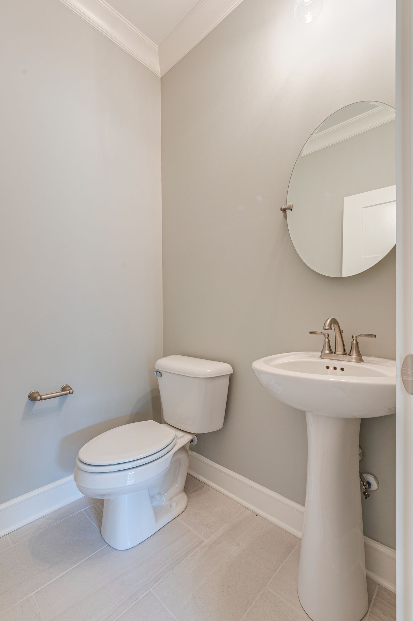 12425 North Milton Road Milton, TN 37118 - Photo 19 of 34 a bathroom with a toilet a sink and mirror