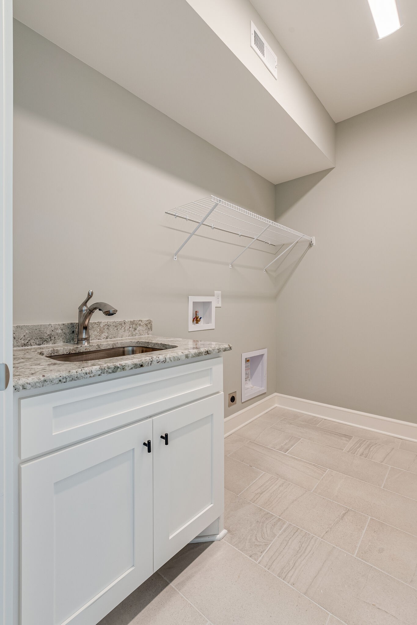 12425 North Milton Road Milton, TN 37118 - Photo 21 of 34 a bathroom with a granite countertop sink and white cabinets