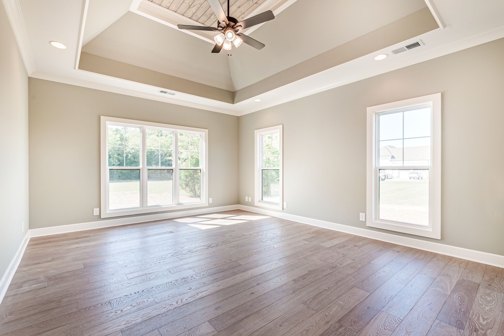 12425 North Milton Road Milton, TN 37118 - Photo 22 of 34 a view of an empty room with wooden floor and a window