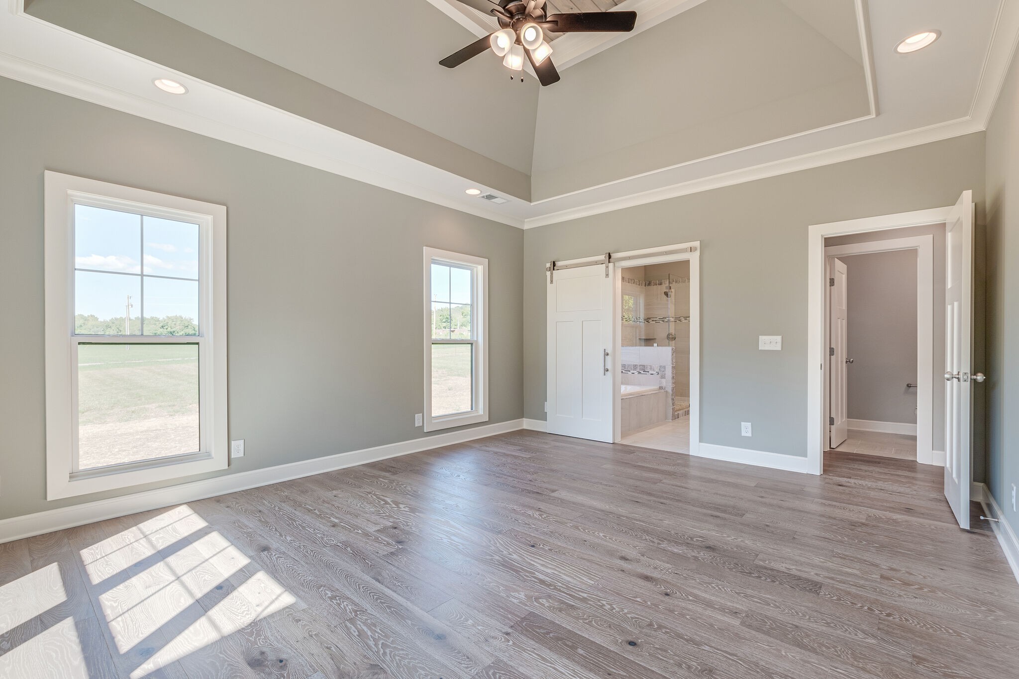 12425 North Milton Road Milton, TN 37118 - Photo 23 of 34 a view of an empty room with window and wooden floor
