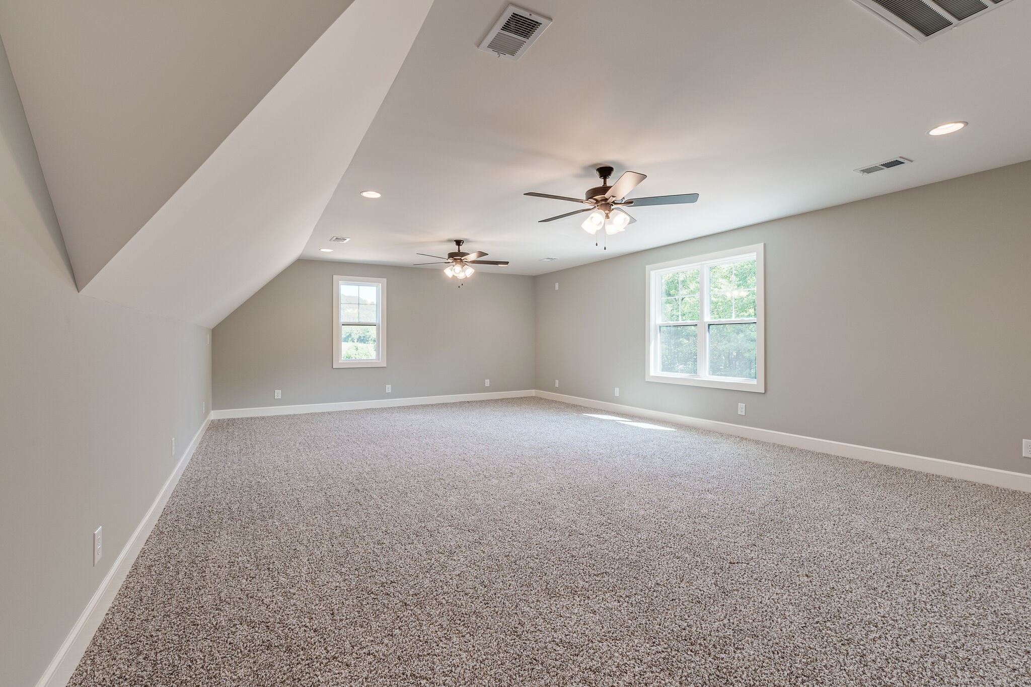 12425 North Milton Road Milton, TN 37118 - Photo 29 of 34 an empty room with windows and ceiling fan