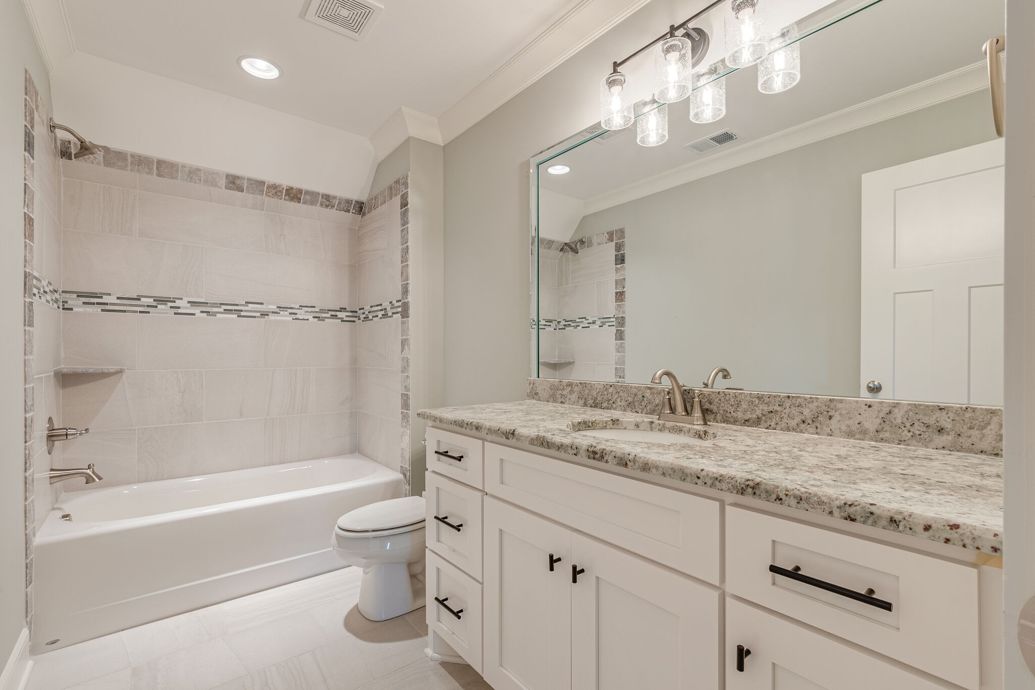 12425 North Milton Road Milton, TN 37118 - Photo 33 of 34 a bathroom with a granite countertop sink a toilet and shower
