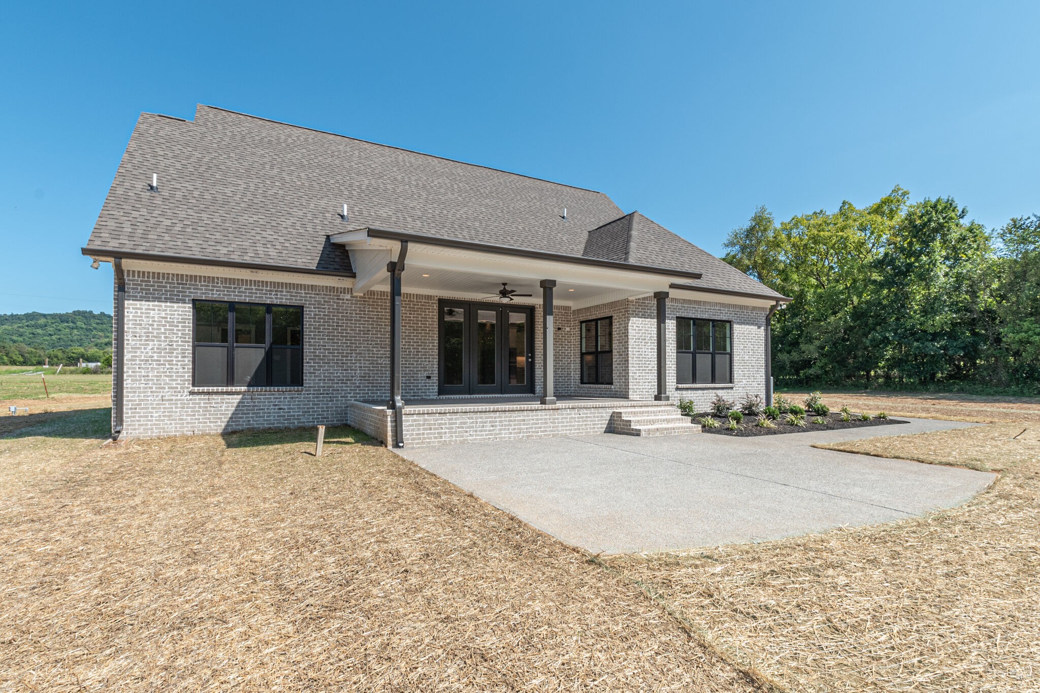 12425 North Milton Road Milton, TN 37118 - Photo 34 of 34 a view of a house with backyard and sitting area