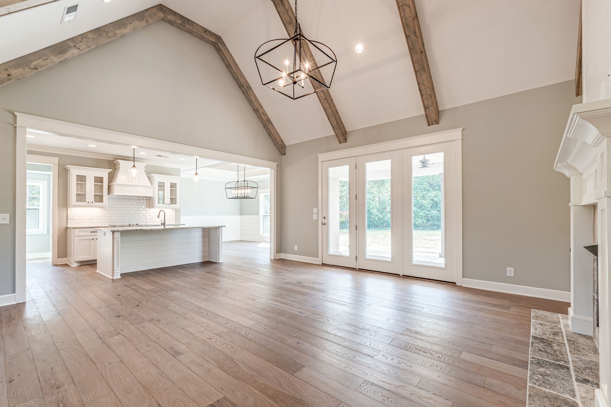 12425 North Milton Road Milton, TN 37118 - Photo 5 of 34 a view of an empty room with wooden floor and a window