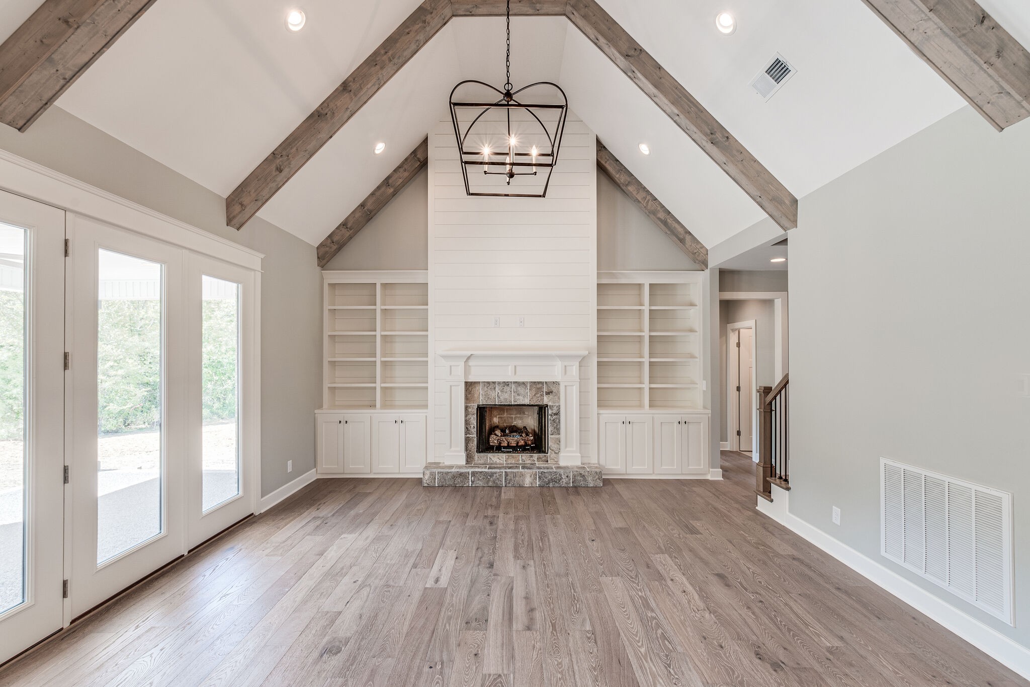 12425 North Milton Road Milton, TN 37118 - Photo 8 of 34 a view of a livingroom with a fireplace wooden floor and window