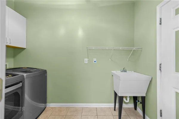a view of a hallway with furniture