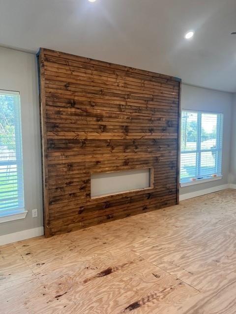 501 Rose Street Merkel, TX 79536 - Photo 7 of 13 a view of empty room with wooden floor and fan