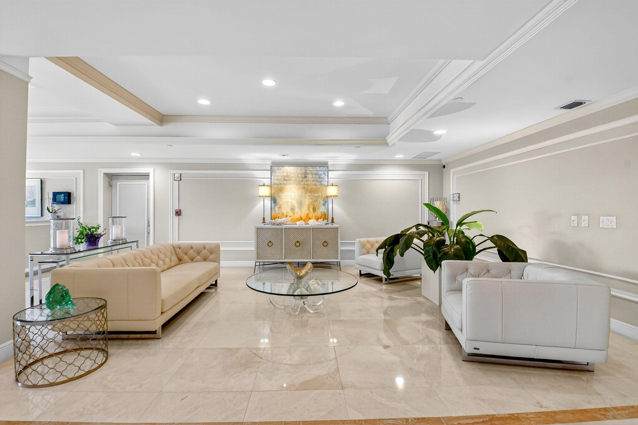 3390 South Ocean Boulevard, Unit 305 Palm Beach, FL 33480 - Photo 24 of 48 a living room with furniture flowerpot and wooden floor