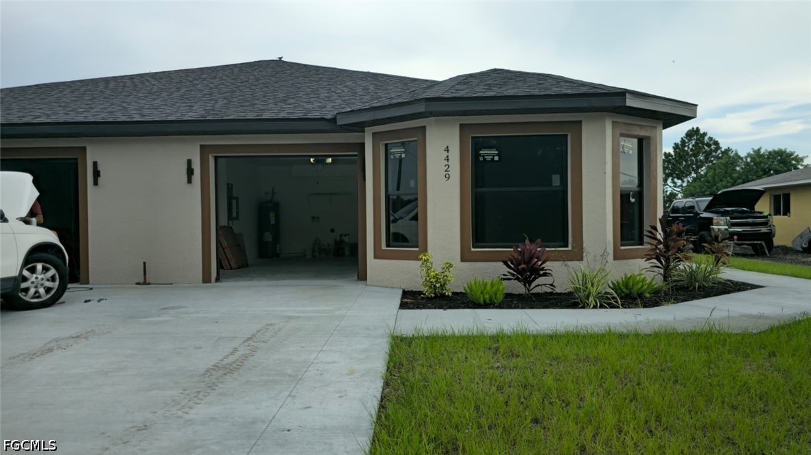 4429 26th Street Southwest Lehigh Acres, FL 33973 - Photo 1 of 16 a view of a house with porch