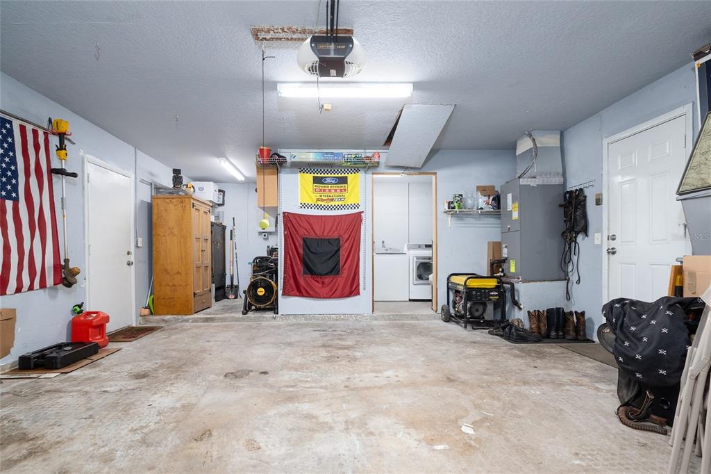 1709 Umbrella Tree Drive Edgewater, FL 32132 - Photo 24 of 37 a view of garage