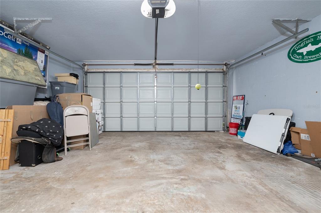 1709 Umbrella Tree Drive Edgewater, FL 32132 - Photo 25 of 37 a view of a garage