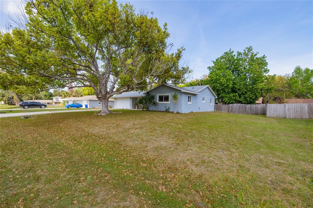 1709 Umbrella Tree Drive Edgewater, FL 32132 - Photo 3 of 37 a house view with swimming pool in front of it