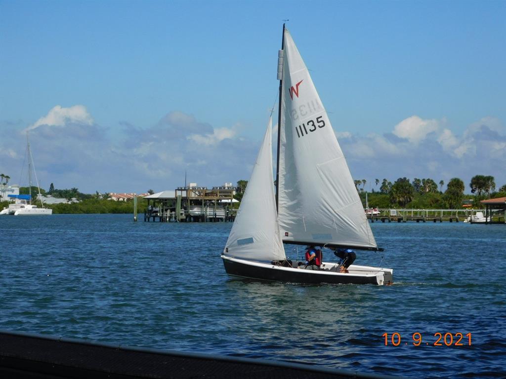 1709 Umbrella Tree Drive Edgewater, FL 32132 - Photo 31 of 37 a view of a lake with a large bridge