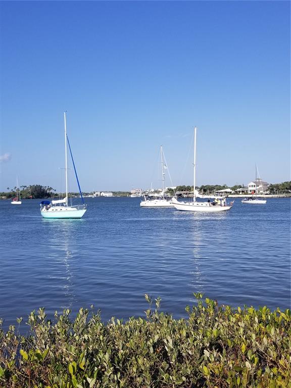 1709 Umbrella Tree Drive Edgewater, FL 32132 - Photo 32 of 37 a view of a terrace with a wooden wall
