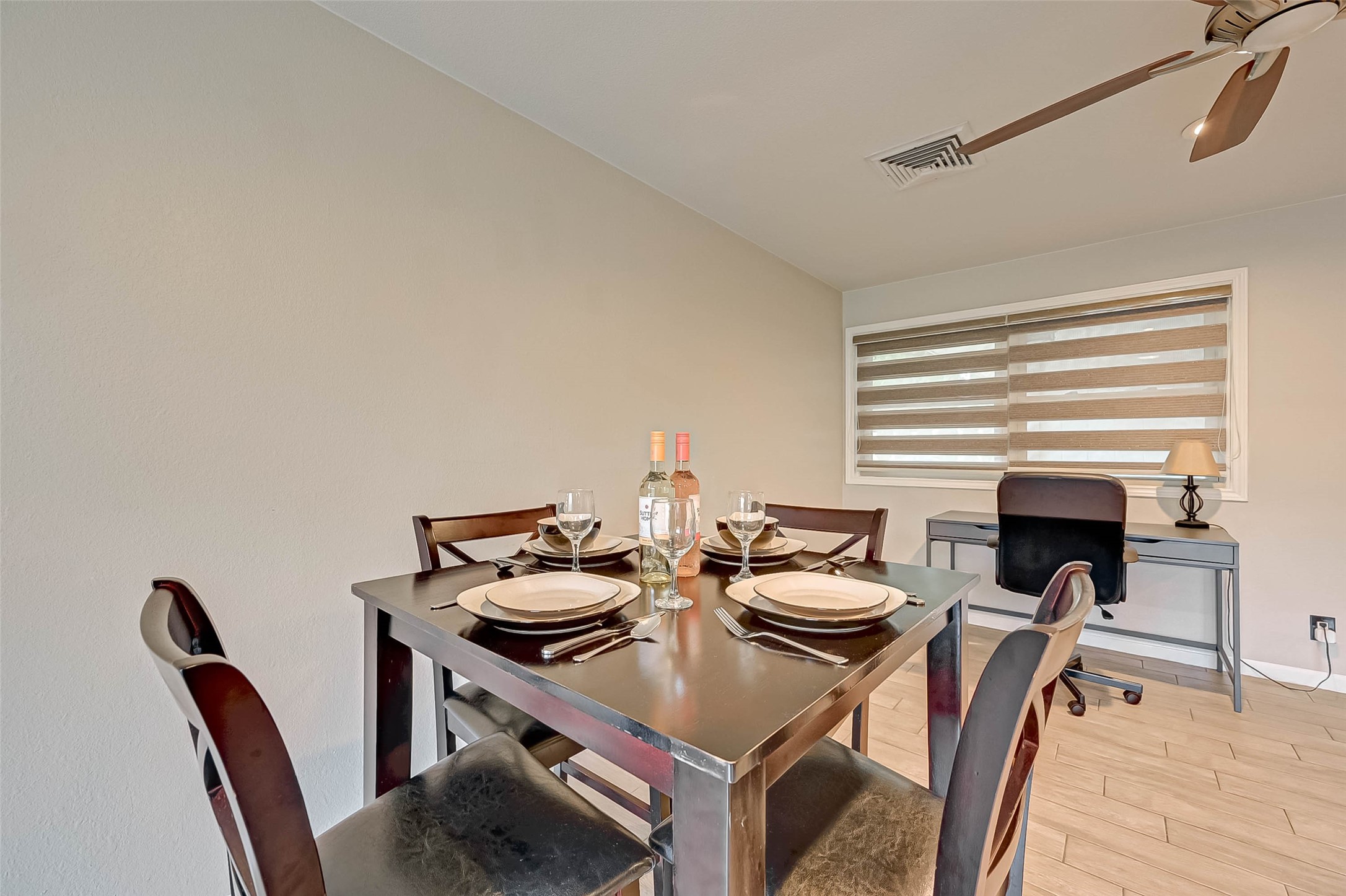 6119 Reamer Street Houston, TX 77074 - Photo 17 of 33 a view of a dining room that has a table and chairs