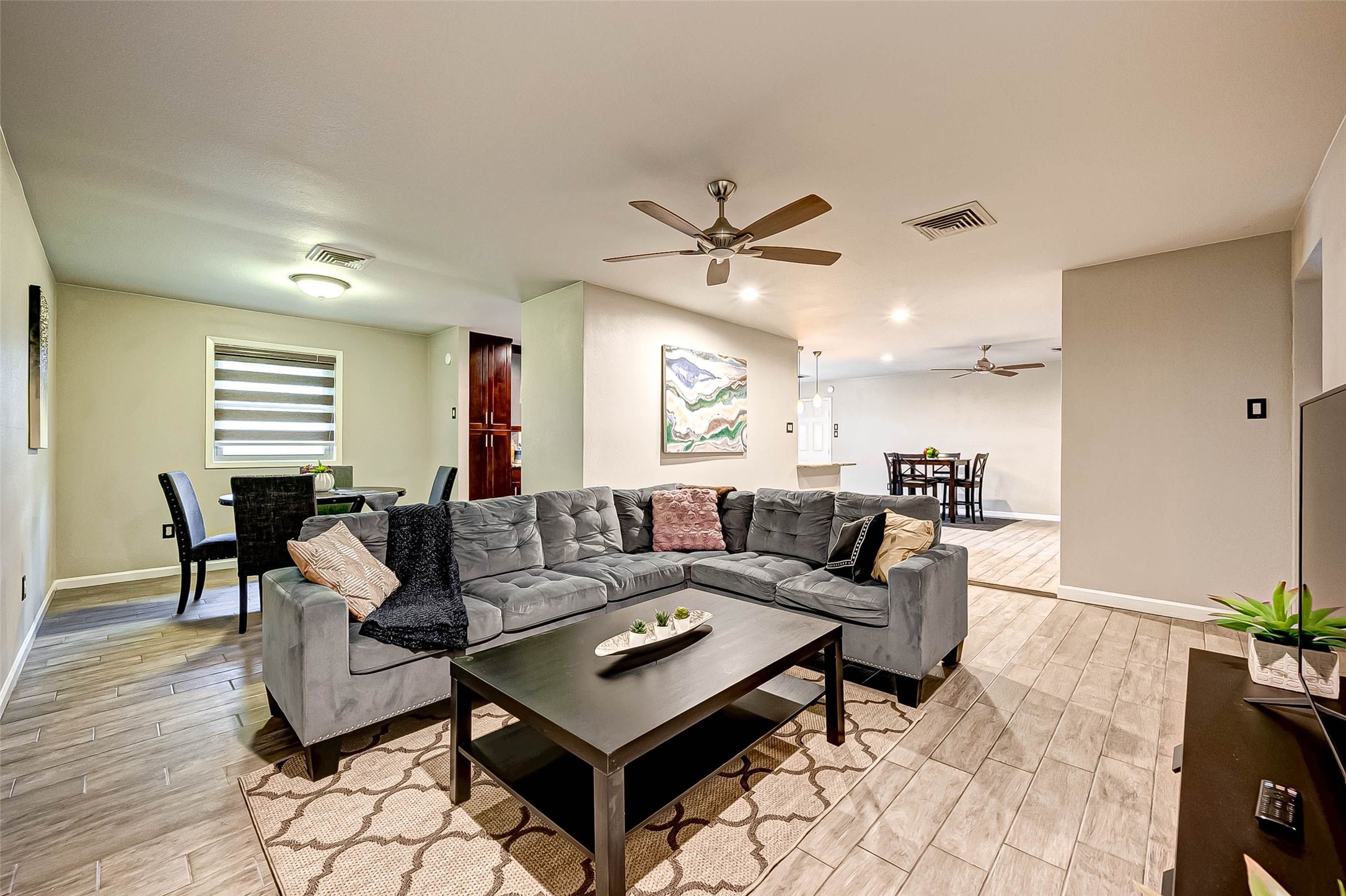 6119 Reamer Street Houston, TX 77074 - Photo 6 of 33 a living room with furniture and a large window