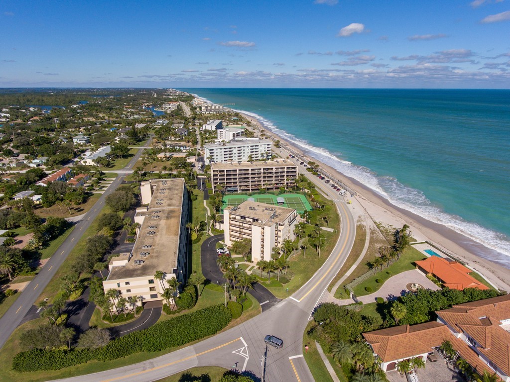 528 7th Square Southwest, Unit 102 Vero Beach, FL 32962 - Photo 23 of 28 an aerial view of a swimming pool with outdoor space