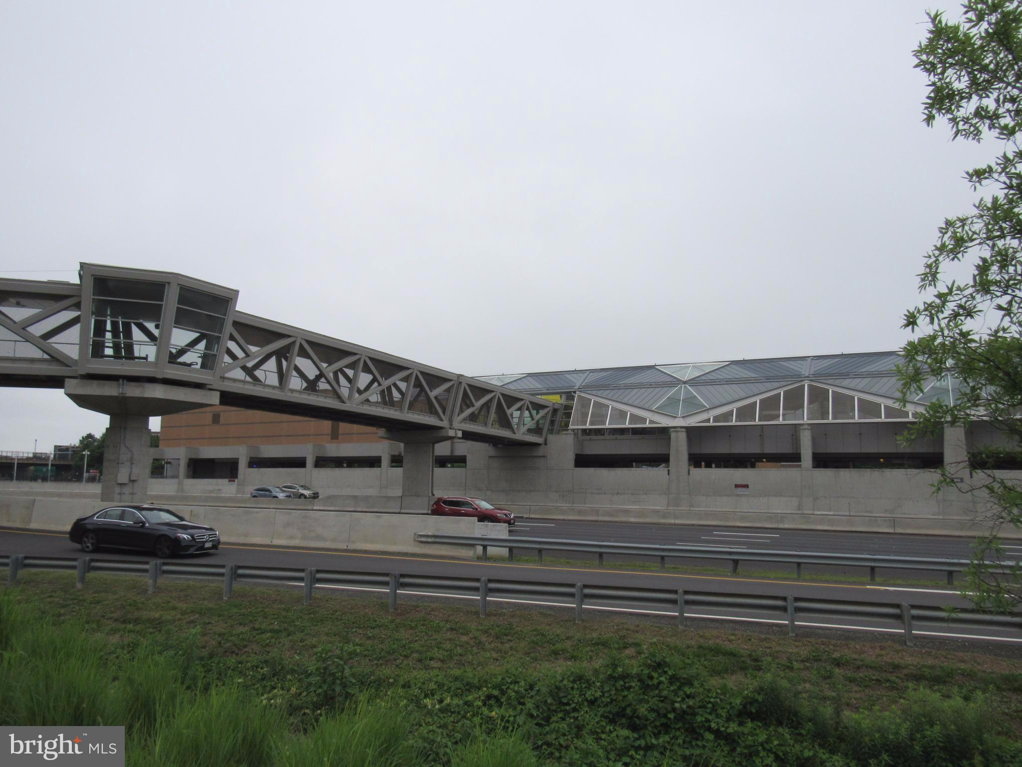 11200 Chestnut Grove Square, Unit 303 Reston, VA 20190 - Photo 29 of 30 a view of a house with a garden