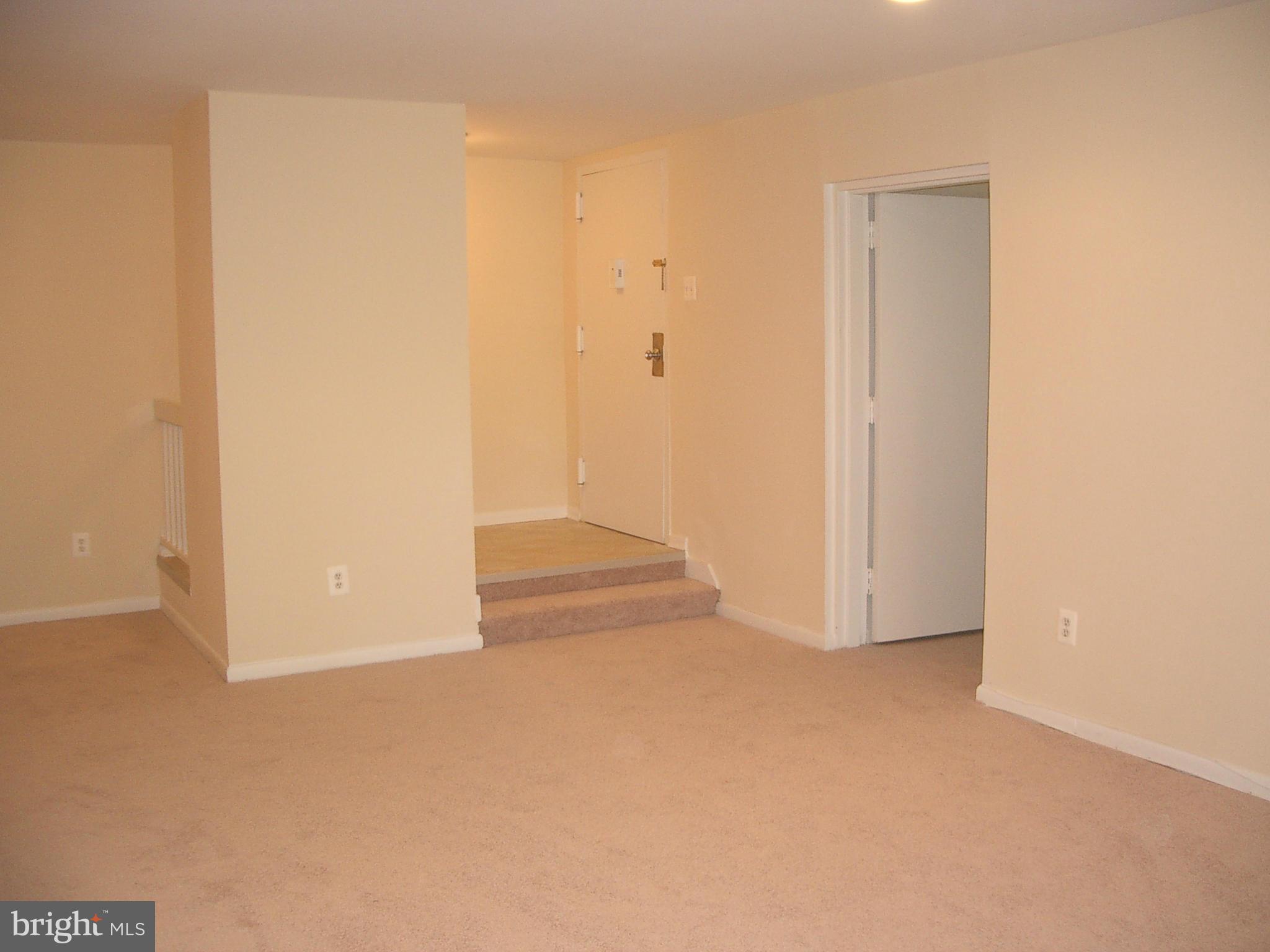 11200 Chestnut Grove Square, Unit 303 Reston, VA 20190 - Photo 5 of 30 a view of an empty room